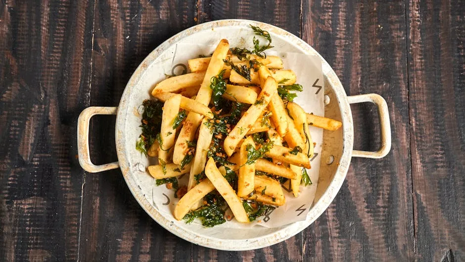 Air fryer with chicken and vegetables