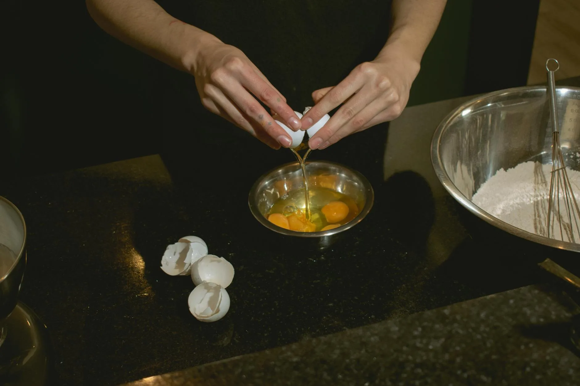 Mixing bowl with flour and eggs for baking preparation