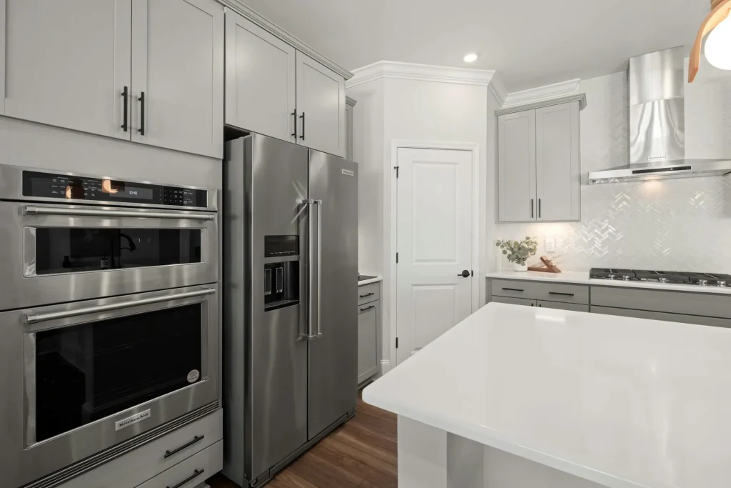 Modern clean kitchen with stainless steel appliances