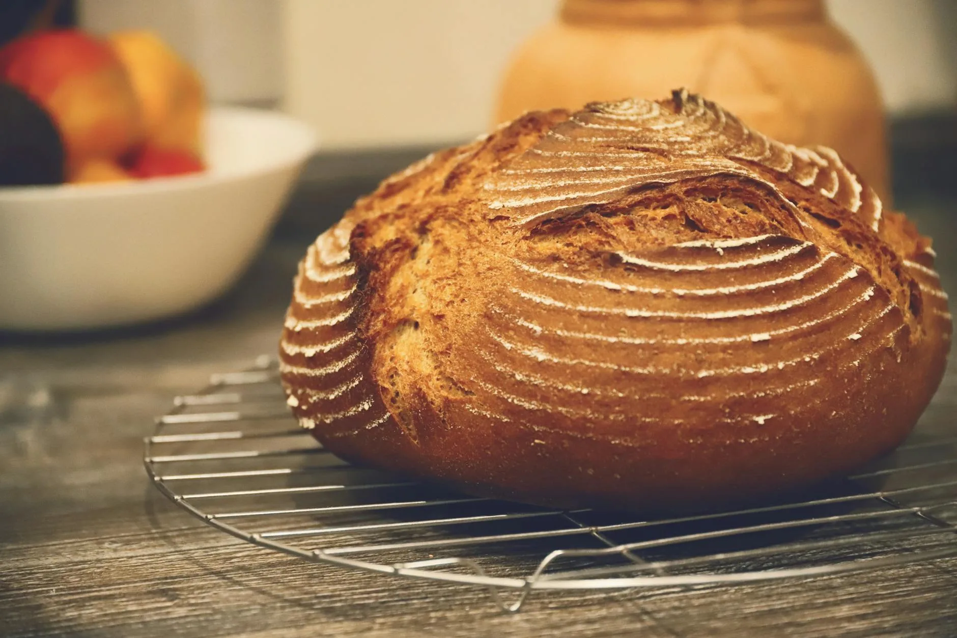 Freshly baked homemade bread loaf cooling on a wire rack