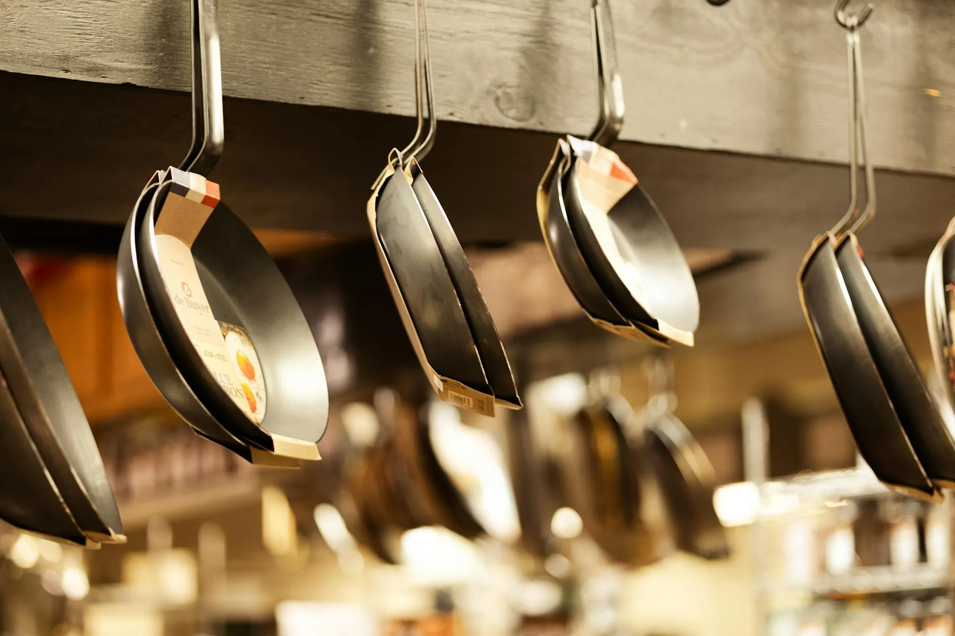 Frying pans on display in a cookware shop
