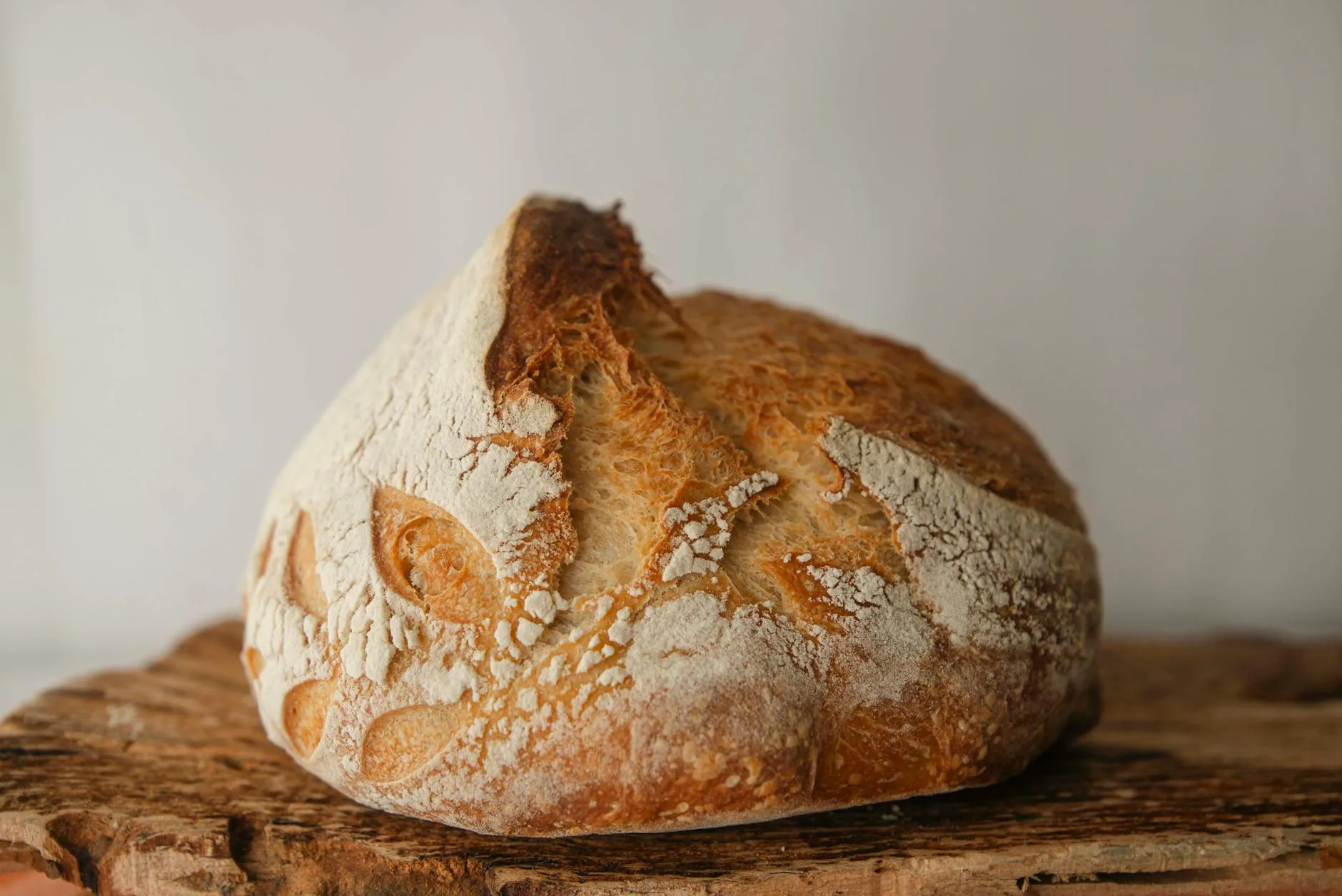 Close-up of artisan sourdough bread with golden crust
