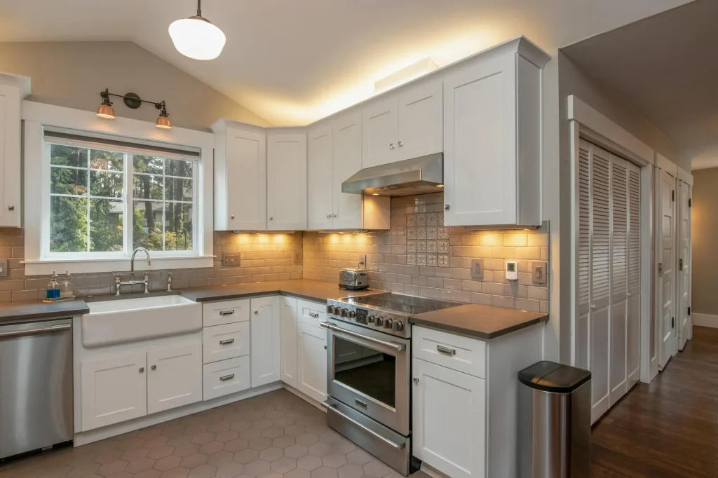 Modern kitchen counter with clean appliances in bright light