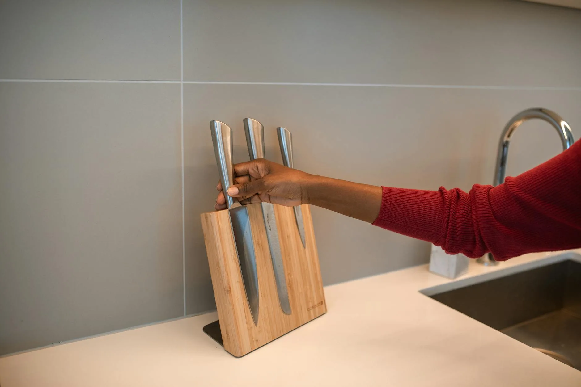 Kitchen knife set in a wooden storage block