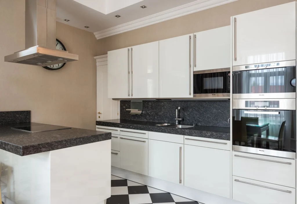 Three slow cooker sizes compared on a kitchen worktop